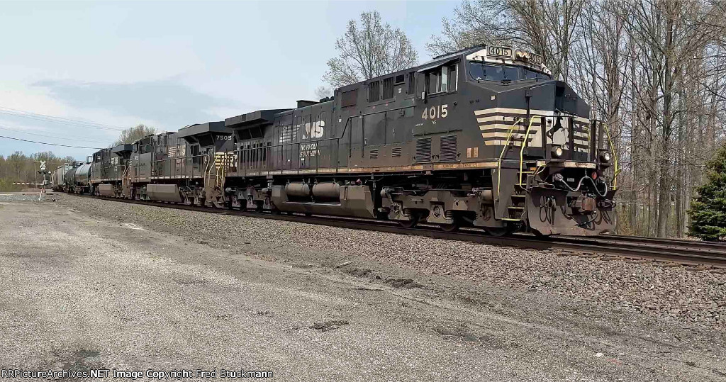 NS 4015 east with mixed freight.